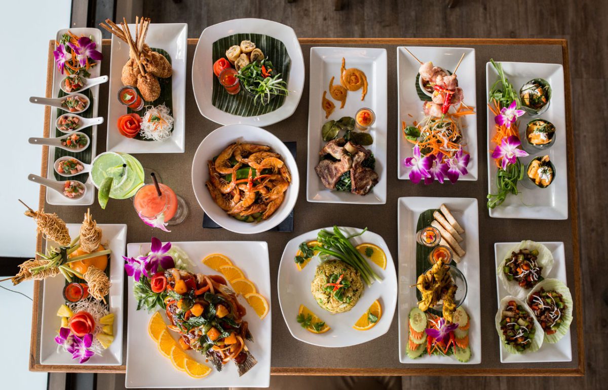 Thai food dishes on table top view.