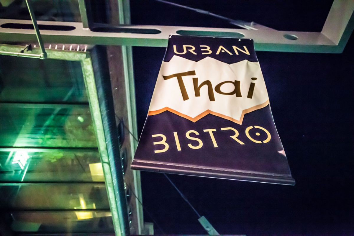 Urban Thai Bistro sign hanging outside.