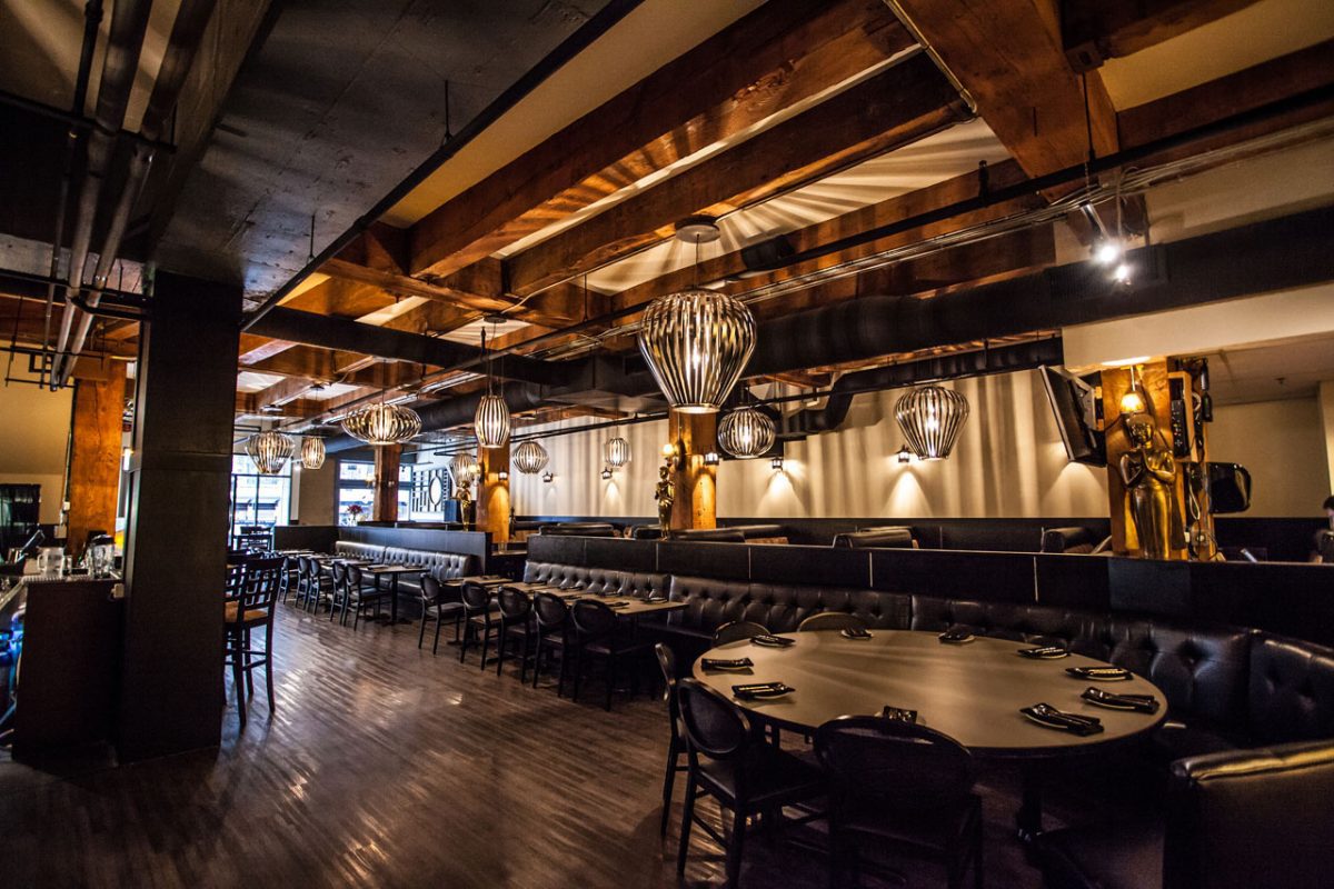 Upscale restaurant interior with dark wood.